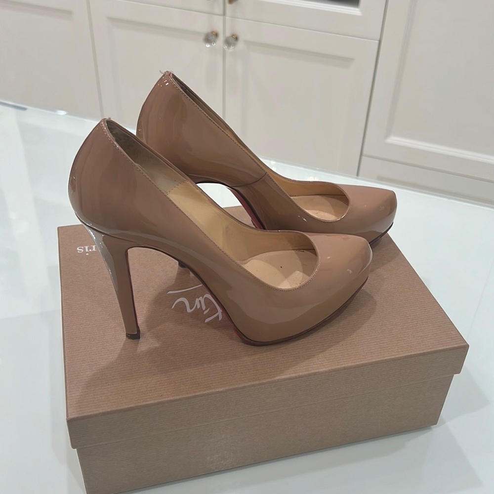 Christian Louboutin patten leather nude heels. Size 38. Good condition.